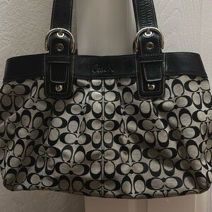 Black and gray Coach shoulder bag